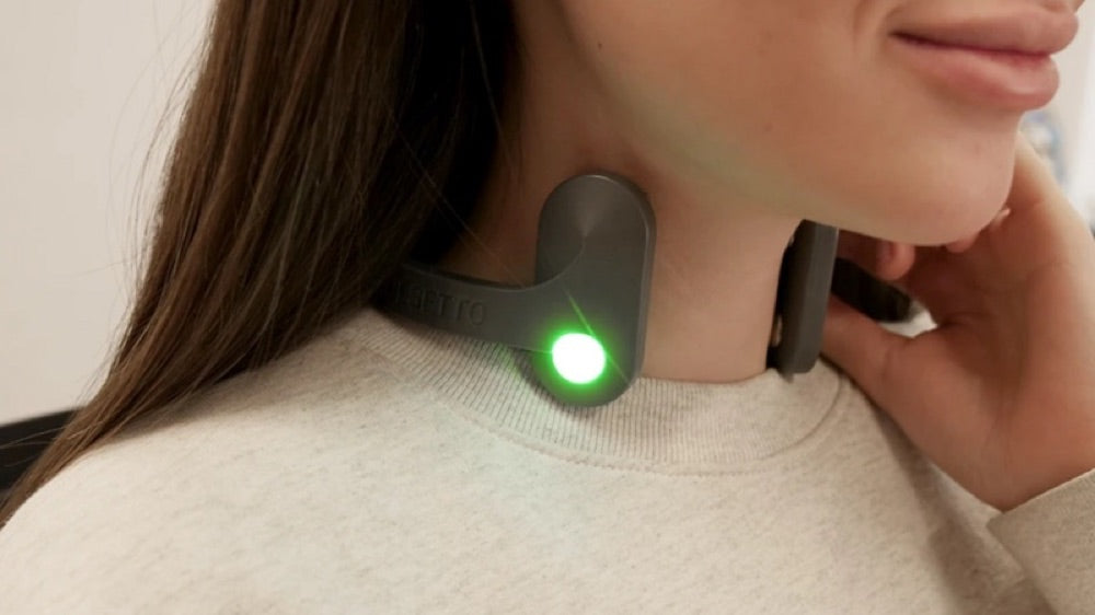 A Pulsetto device worn around the neck